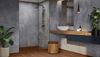 Łazienka z kabiną walk-in w szarym wykończeniu płytkami Ceramika Gres Artport