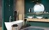 Zielona łazienka z wanną wolnostojącą