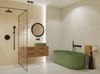 Beżowa łazienka z zieloną wanną wolnostojącą