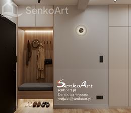 Przedpokój w mieszkaniu z szafą i wieszakiem we wnęce