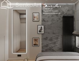 Aranżacja sypialni z betonową ścianą i białym panelem ze strukturą