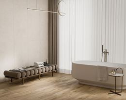 Stylowa łazienka w betonie i drewnie z ceramiką wolnostojącą