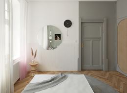 Sypialnia w szarości z białym panelem dekoracyjnym