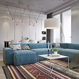 Salon z niebieską sofą