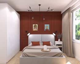 Sypialnia z ceglastą ścianą 