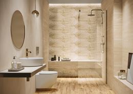 Kremowa łazienka z dekorami ze wzorem liści
