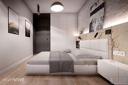 Sypialnia z drewnianym wezgłowiem na ścianie