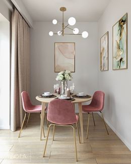Jadalnia z okrągłym stołem i różowymi krzesłami