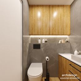 Strefa WC z drewnianą, podświetlaną zabudową