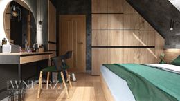 Sypialnia na poddaszu z drewnianą zabudową