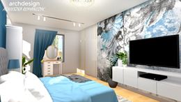 Sypialnia w kolorach nieba ze wzorzystą tapetą