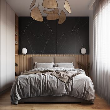 Aranżacja sypialni z czarnym akcentem nad łóżkiem