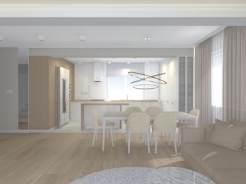 Przestronna kuchnia z biało-drewnianą zabudową