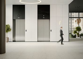 Przestrzeń hotelowa w jasnoszarej kolorystyce
