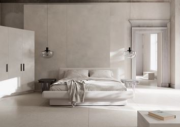 Duża sypialnia w białym betonie