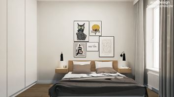 Minimalistyczna sypialnia w bieli i szarości