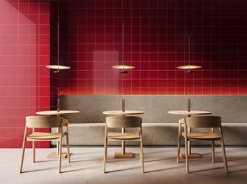 Restauracja w minimalistycznym stylu w bordowych kaflach