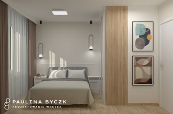 Biała sypialnia ze sztukaterią i kolorowymi grafikami
