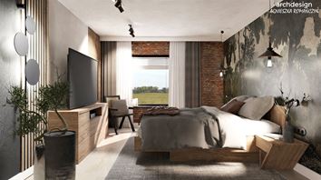 Loftowa sypialnia z tapetą za łóżkiem