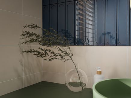 Detal granatowych cegiełek na ścianie w łazience