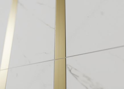 Detal złotej listewki z kolekcji Cerrad Metallic