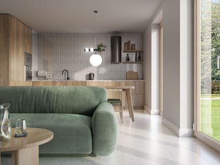 Kuchnia z perłową cegiełką otwarta na salon