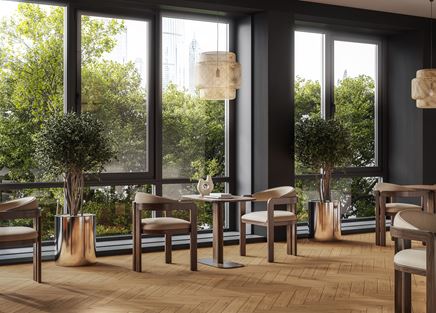 Stylowe wnętrze kawiarni z jodełkową podłogą