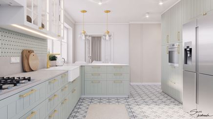 Miętowa zabudowa meblowa w kuchni z patchworkiem na podłodze