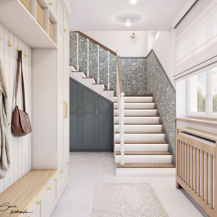 Szary wiatrołap z drewniano-białymi schodami