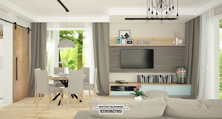 Salon skandynawski - widok na ściankę telewizyjną z szarą cegłą i stół jadalny