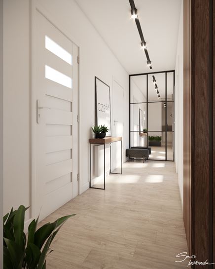 Minimalistyczny hol wejściowy w bieli