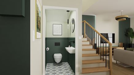 Biało-zielona toaleta przy schodach w domu