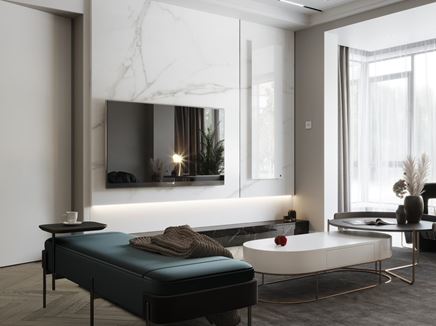 Biały grzejnik elektryczny przy telewizorze w salonie