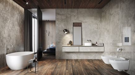 Przestronna łazienka przy sypialni w wykończeniu w betonie i drewnie