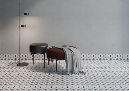 Szary salon i patchworkowe wykończenie podłogi