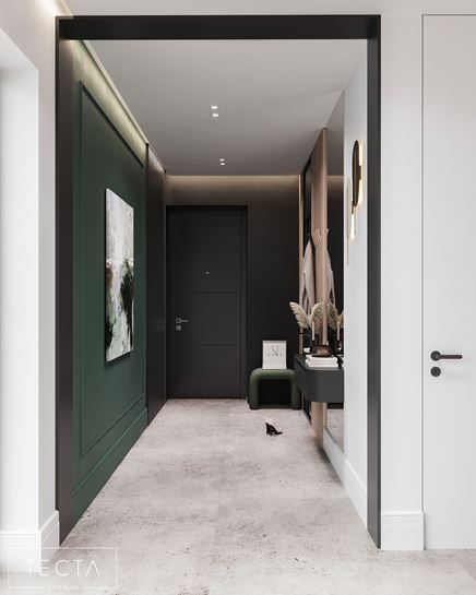 Czarno-zielony przedpokój ze sztukaterią