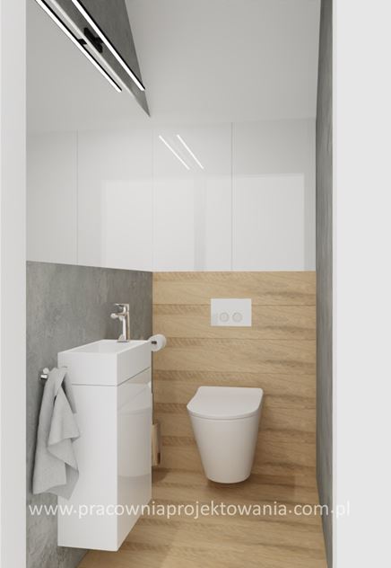 Malutka toaleta z bielą i drewnem
