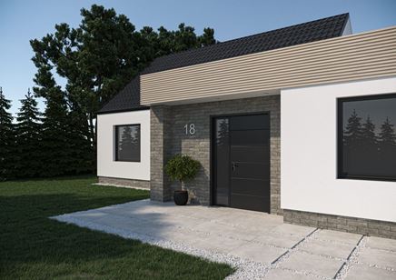 Wejście do domu wykończone szarą cegiełką