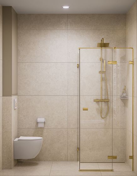 Kabina narożna ze złotymi profilami w łazience w kremowym kamieniu