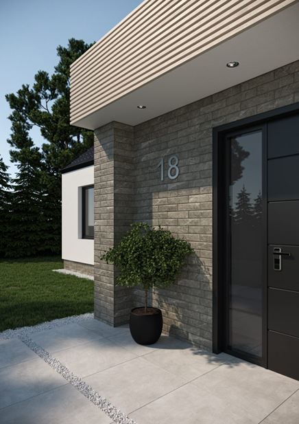 Ściana elewacyjna wykończona szarą cegiełką