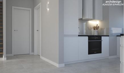 Minimalistyczna kuchnia z białą zabudową