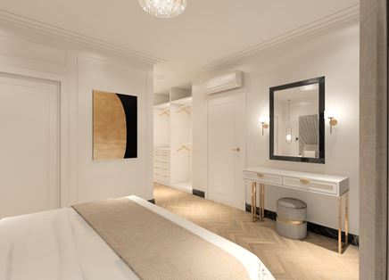 Biała sypialnia z toaletką na złotych nogach