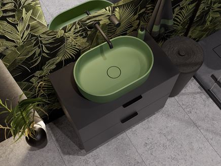 Zielona strefa umywalkowa z ceramiką nablatową