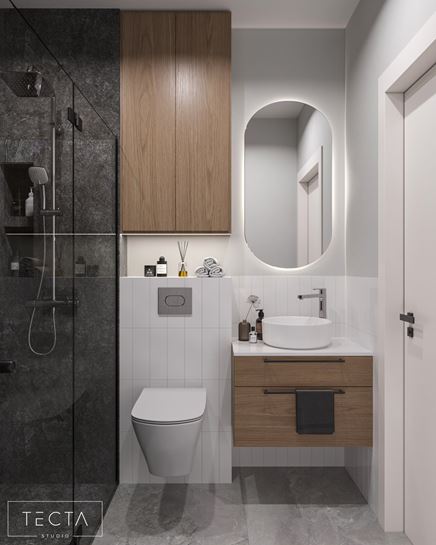 Biało-szara łazienka z prysznicem i drewnianymi szafkami