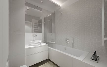 Strefa kąpielowa z parawanem nawannowym w białej łazience