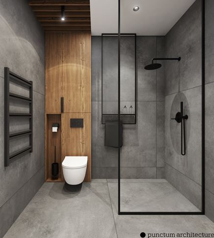 Łazienka z betonem i WC w drewnianej zabudowie