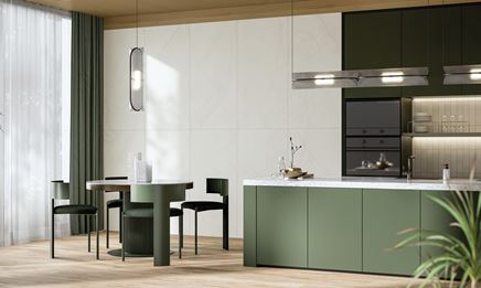 Kuchnia z jadalnią z zielonymi meblami