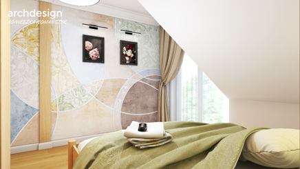 Kolorowa tapeta w sypialni ze skosami