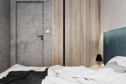 Sypialnia z betonem i jasnym drewnem