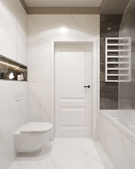 Biała łazienka z kontrastową strefą kąpielową w ciemnym kamieniu
